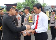 Polres Kolaka Timur Gelar Upacara Peringatan Harkitnas ke-117, Beri Penghargaan kepada 27 Personel Berprestasi. 